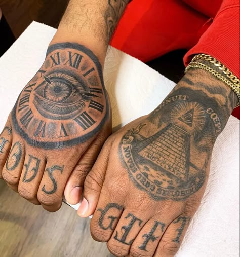 La Hands Sign Tattoo, Hood Tattoo For Men Hand, Hand To Arm Tattoo For Men, Wrist And Hand Tattoos Men, Trap Tattoos Men Hand, Money Hand Tattoos For Guys, Gangsta Hand Tattoos, Hood Hand Tattoos For Men, Hand Tattoos Black Man