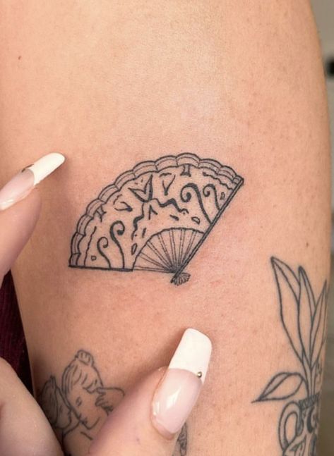 Spanish Symbols Tattoo, Spain Symbols Tattoo, Small Spain Tattoo, Simple Fan Tattoo, Tattoos To Get In Spain, Spanish Inspired Tattoos, Dancing Circle Tattoo, Spaniard Tattoo, Small Fan Tattoo