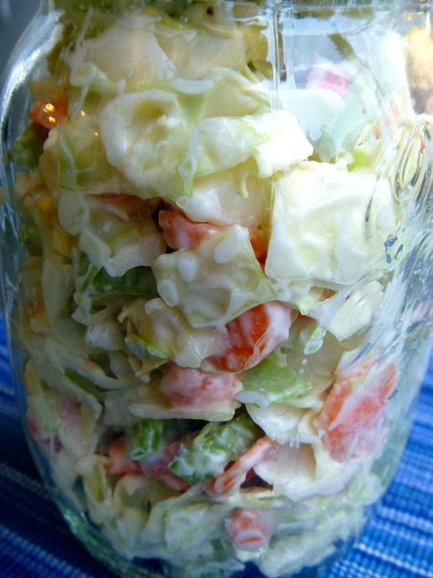 Creamy Ranch Slaw Recipe ~ is easy to make, low calorie, and sure to please a crowd!  This slaw is dressed with a lite homemade ranch-style dressing.  The taste is perfect for the salad which has some added crunch with celery and carrots. Ranch Coleslaw, Ranch Slaw, Yummy Veggies, Creamy Ranch, Slaw Recipe, Cole Slaw, Cold Salad, Homemade Ranch, Slaw Recipes