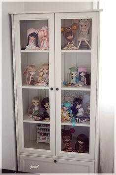 I have my Barbie dolls on display in a cabinet like this. Doll Display Cabinet, Doll Cabinet Display, Doll Shelf Display, Barbie Rooms, Easter Dolls, Doll Museum, Barbie Room, Figure Display, Pullip Dolls