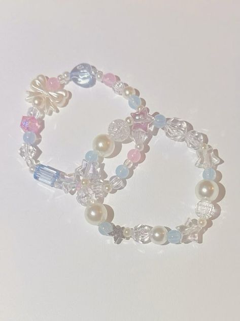 $5/custom bracelet DM on instagram Pink Blue Bracelet, Circle Bead Bracelet Ideas, Handmade Bracelets With Beads, Bracelets Inspo Beads, Beaded Bow Bracelet, Coquette Beaded Bracelet, Beaded Bracelet Inspiration, Aesthetic Bracelets Ideas, Aesthetic Beads Bracelet