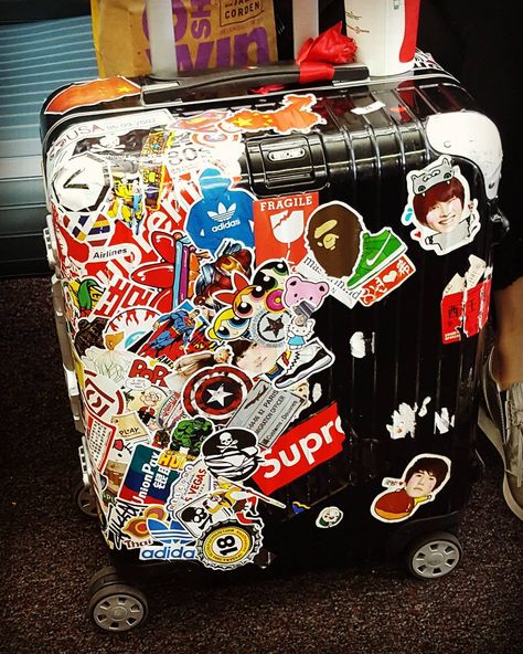 I can only assume that the stickers are actually holding the suitcase together. Stickers On Suitcase Aesthetic, Rimowa Luggage Aesthetic Stickers, Luggage Stickers Suitcases, Sticker Suitcase Luggage, Vintage Luggage Stickers, Rimowa Luggage, Suitcase Stickers, Suit Pin, Luggage Stickers