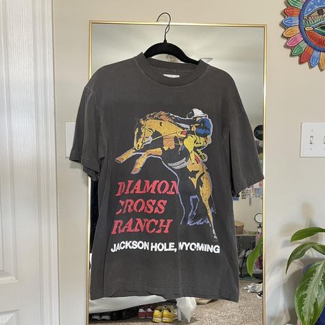 Diamond Cross Ranch Rodeo Tee size Medium Jackson... - Depop Diamond Cross Ranch Shirt, Cotton Graphic Tee For Rodeo, Diamond Cross Ranch, Spring Rodeo Graphic Tee, Short Sleeve Graphic T-shirt For Rodeo, Cowboy Ranch, Rodeo Graphic Crew Neck T-shirt, Jackson Hole Wyoming, Horse Shirt