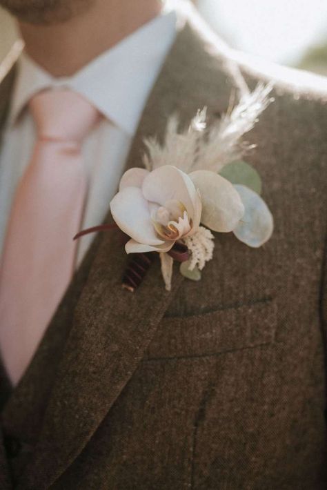 Blush Orchid and Pampas Grass Buttonhole | By Lenny Pellico | Wedding Flowers | Wedding Bouquet | Bridal Bouquet | Pampas Grass Wedding Bouquet | Pampas Grass at Wedding | Blush Wedding Flowers | Pink Wedding Flowers | Groom Wedding Suit | Groom Buttonhole | Groom Outfit | Groom Flowers Orchid And Pampas Grass Bouquet, Pampas And Orchid Wedding, Pampas Buttonhole, Pompadour Grass Wedding, Orchid Buttonhole, Groom Buttonhole, Orchid Boutonniere, Orchid Corsages, Orchid Bouquet Wedding