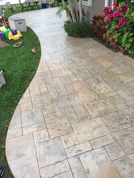 Stamped Concrete - All Seal Exteriors Patio Ideas Stamped Concrete, Stamped Colored Concrete Patio, Light Stamped Concrete Patio, Stamping Concrete Patio, Stamped Concrete Patio Around Pool, Curved Stamped Concrete Patio, Tan Stamped Concrete Patio, Stamp Concrete Walkway, Stamped Concrete Pavers