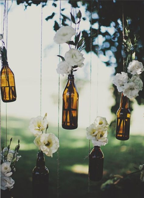 Hanging vases for the garden Hanging Bottles, Wine Bottle Centerpieces, Bottle Centerpieces, Hanging Lighting, Hippie Wedding, Wine Bottle Diy, Vineyard Wedding, Vow Renewal, Wedding Planners