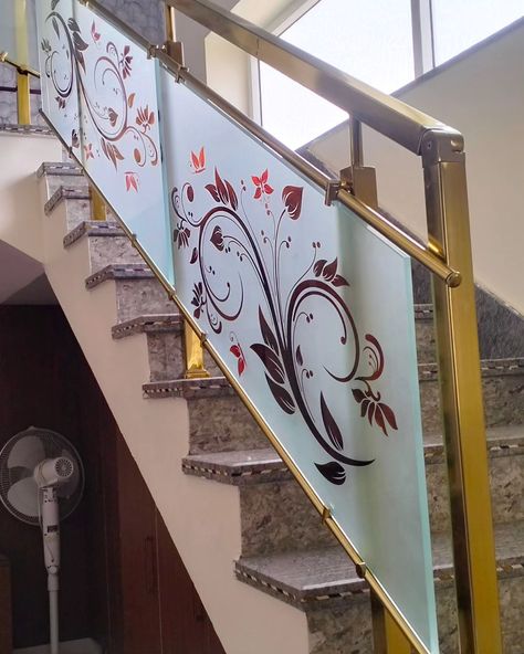 Gold finish duplex staircase glass railing Contact us for more details.. Mahaveerssmetal Staircase Glass Railing Design, Staircase Glass Railing, Staircase Glass Design, Glass Railing Design, Reling Design, Duplex Staircase, Staircase Glass, Glass Staircase Railing, Etching Designs