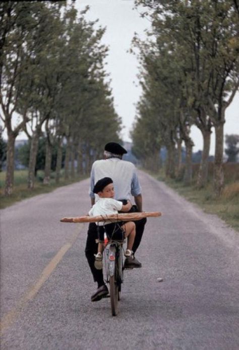 'Granddaddy on bicycle with litlle boy and baguette, Provence' by Elliott Erwitt, Elliot Erwitt, Dollhouse Bakery, Elliott Erwitt, Hot Bread, French People, Basque Country, Provence France, Magnum Photos, French Countryside