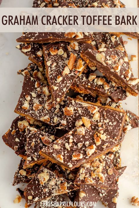 A twist on the classic toffee bark-- made with an easy butter and brown sugar toffee, this graham cracker toffee bark is a perfect sweet, salty, and sticky treat. Dress it up with festive sprinkles for holidays or other celebrations! via @frshaprilflours | easy graham cracker toffee bark recipes | toffee bark with graham crackers | christmas toffee bark | christmas bark easy cracker toffee | christmas toffee bark recipes Gram Cracker Toffee Bark, Toffee Gram Crackers, Caramel Graham Cracker Bark, Christmas Bark Graham Crackers, Avalanche Bark Recipe, Cowboy Bark Pioneer Woman, Graham Cracker Bark Christmas, Pretzel Cracker Bark Recipe, Christmas Goodie Trays