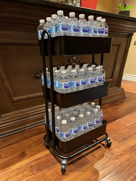 14 Efficient Bottled Water Storage Ideas for Small Spaces - Addicted To Organization Drink Storage Ideas Garage, Diy Drink Storage Ideas, Extra Drink Storage Ideas, Bottle Water Storage Ideas, Bottled Water Storage Ideas, Water Bottle Organization Ideas, Bottled Water Storage, Drink Storage Ideas, Water Storage Ideas