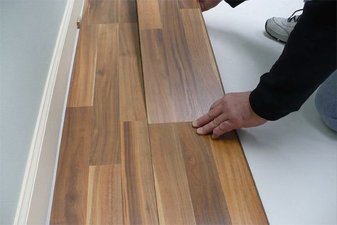 Many floating floorboards lock together by angling the tongue of one board into the groove of another. Image: Tarkett installation instructions. Floating Floorboards, Flooring For Home, Floating Floors, Attic Ideas, Floor Boards, Renovation Inspiration, Floating Floor, Remodeling Mobile Homes, Diy Flooring