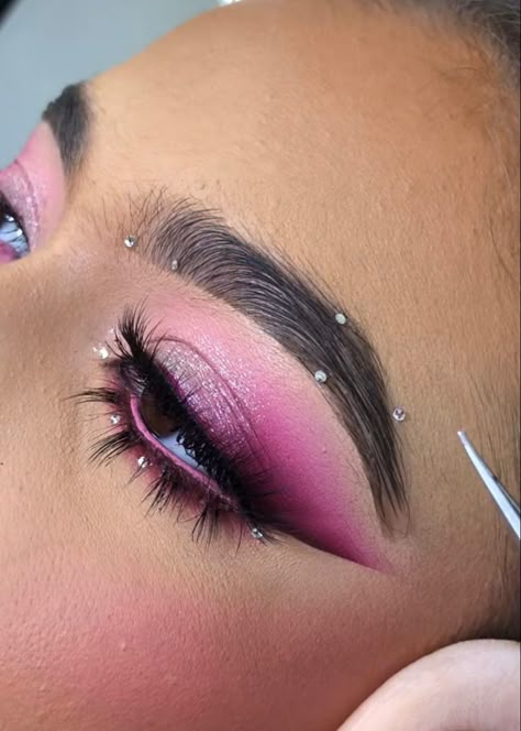 Gold And Pink Eye Makeup, Pink Makeup Rhinestones, Festival Eyeshadow Looks, Halo Eye Makeup Look, Pink Graphic Liner Makeup, Pink Black Eyeshadow, Soft Purple Makeup Looks, Pink And Silver Eyeshadow, Pink Rave Makeup