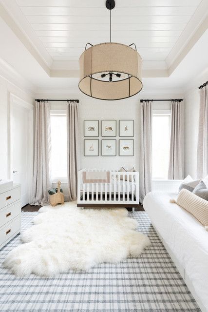 nursery design + faux fur rug + white rug + soft color palette + plaid rug + white couch + white crib + light grey dresser + changing table + nursery inspo | Scout & Nimble White Crib Boy Nursery, White Crib Nursery, White Rug Nursery, Modern Lighting Ideas, Luxury Baby Room, Nursery Guest Room, Nursery Changing Table, White Crib, Nursery Room Design