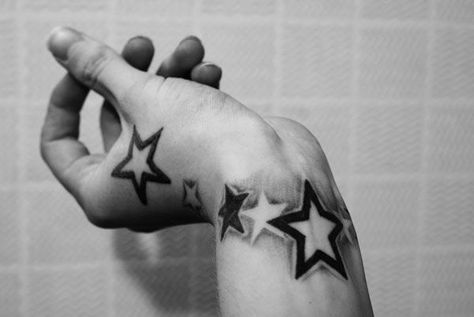 43 Cool and Sexy Star Tattoo Designs Star Tattoo On Wrist, Tattoos Infinity, Star Tattoo Designs, Wing Tattoo, Tattoos Skull, Weird Tattoos, Tattoo Arm, Tattoo Designs For Girls, 1 Tattoo