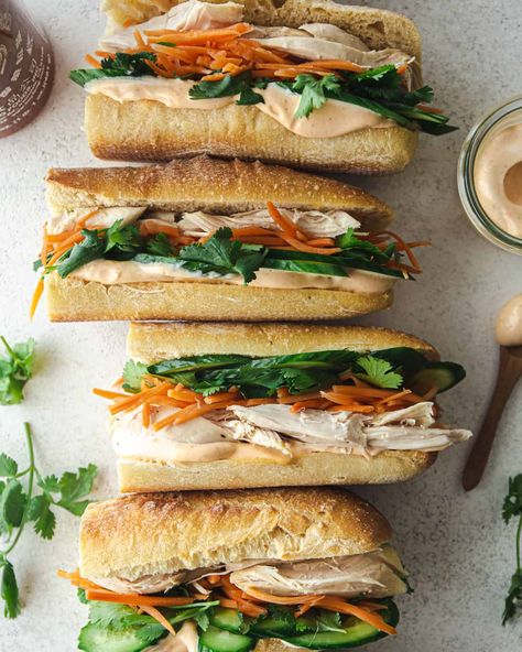 Chicken banh mi sandwiches are stuffed with tangy pickled vegetables, crunchy cucumbers, juicy shredded chicken, and served on a super soft baguette with a layer of creamy, spicy sriracha mayo. You won’t believe how easy it is to make these mouthwatering Vietnamese sandwiches! #sandwich #chicken #lunch #pickles #Asianrecipe Chicken Baguette, Banh Mi Sandwich Recipe, Chicken Banh Mi, Juicy Shredded Chicken, Soft Oatmeal Cookies, Sandwich Chicken, Baguette Sandwich, Vietnamese Sandwich, Banh Mi Sandwich