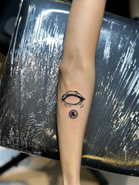 an empty eyeball tattoo with its pupil outside. black ink tattoo. Scary Eyeball Tattoo, Small Eyeball Tattoo, Blind Eye Tattoo, Googly Eye Tattoo, Melting Eye Tattoo, Pair Of Eyes Tattoo, Eye Ball Tattoos, Eye Of The Beholder Tattoo, White Eyes Tattoo