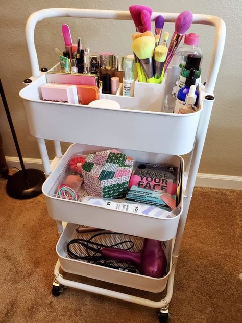 A three-tier storage cart that can hold anything that needs sorting, from beauty products to craft supplies. Trolley Cart Organization, Make Up Storage Cart, Beauty Storage Bedroom, Storage Beauty Products, 3 Tier Trolley Storage Ideas, Three Tiered Cart Ideas, Vanity Cart Ideas, Makeup Cart Organizing, Beauty Supplies Organization