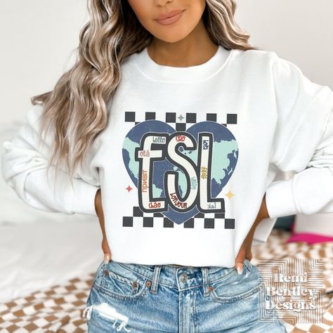 white colored sweatshirt with heart shaped earth and giant letters ESL with word hello in several different languages Hello Gift, School Spirit Wear, Esl Teachers, Student Teacher, Second Language, English As A Second Language, Student Fashion, Trendy Tee, School Spirit