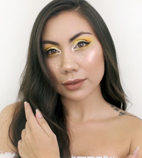 If you need some yellow eyeshadow makeup inspo, I created this bright and vibrant look using BHcosmetics. I paired off this yellow eyeshadow look with some yellow star glitters for a cute and fun effect. You can wear this make up to a music festival or simply just for fun. This was one of my favorite yellow eyeshadow looks because it really made my brown eyes pop!  For more makeup tips and tutorials, subscribe to my Youtube channel! Thank you so much! Eyeshadow With Glitter, Yellow Eyeshadow Looks, Glitter Eyeshadow Tutorial, Glitter Freckles, Eyeshadow Makeup Looks, Pink Glitter Makeup, Glittery Eye Makeup, Brown Eyes Pop, Sparkle Makeup