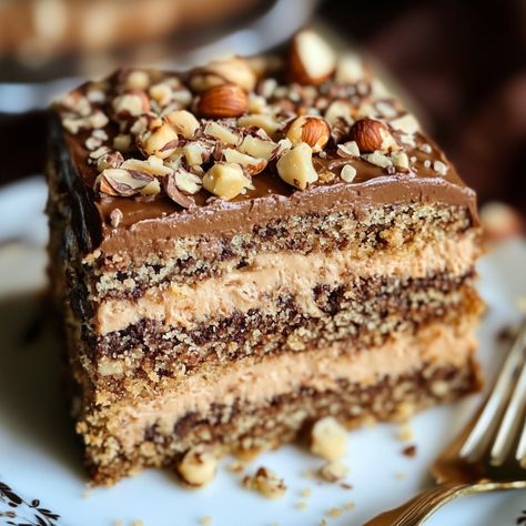 Indulge in the rich flavors of this Hazelnut Coffee Cake, featuring a moist crumb, nutty richness, and a hint of coffee. Almond Flour Desserts, Hazelnut Dessert, Hazelnut Cake, Hazelnut Coffee, Nut Recipes, Coffee Cake Recipes, Breakfast At Tiffanys, Coffee Flavor, Coffee Cake