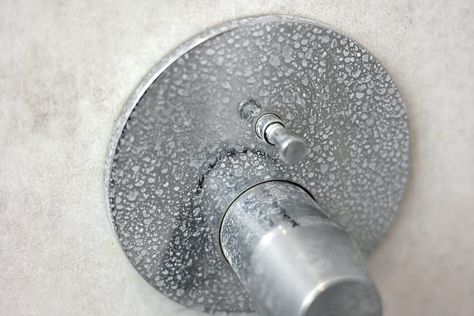 How to Easily Remove Hard-Water Stains from Any Surface, According to Cleaning Pros Remove Water Stains From Stainless Steel, How To Remove Hard Water Stains, How To Remove Hard Water Build Up, Shower Door Cleaner, Remove Water Spots, Remove Water Stains, One Glass Of Wine, Hard Water Spots, Corrugated Tin