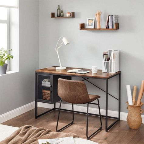 Create a stylish workspace with this industrial home office desk, complete with built-in storage. This wood and metal desk is constructed with high-grade steel with matte black coating, topped with laminated rustic brown particle board. It features a practical, built-in storage cabinet with height adjustable shelves. For ensured stability, this industrial home office desk has adjustable feet to suit any uneven surface. Steel Mesh Door, Dr Bedroom, Mesh Cabinet, Wood And Metal Desk, Industrial Style Desk, Industrial Home Offices, File Cabinet Desk, Brown Desk, Desks For Small Spaces