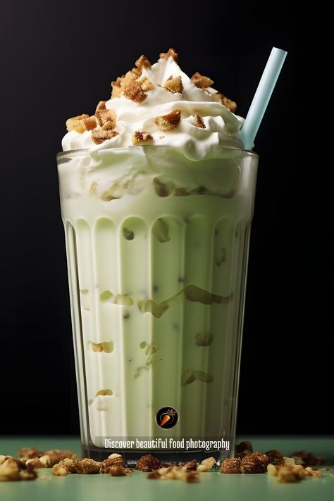 Indulge in the ultimate decadent treat with this sweet, creamy Pistachio Pecan Praline Milkshake. This rich and flavorful milkshake is nutty and caramelized, offering a smooth and satisfying thick texture that is sure to please. With its frosty and creamy consistency, this indulgent beverage is both delicious and satisfying. Treat yourself to a creamy, creamy, sweet, nutty, caramelized, indulgent, smooth, flavorful, rich, decadent, thick, frosty, satisfying, delicious milkshake. Perfect for an Pistachio Milkshake, Pecan Praline, Pecan Pralines, Treat Yourself, Pistachio, Caramel, Texture