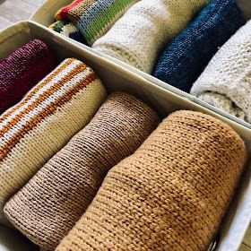 Knitionary: how to fold and store sweaters Fold Bulky Sweaters To Save Space, How To Roll Sweaters For Packing, Folding Sweaters For Drawers, Marie Kondo Folding Sweaters, Fold Sweaters For Drawers, How To Fold Long Cardigans, Bulky Sweater Storage, Best Way To Fold Sweaters, How To Store Jumpers