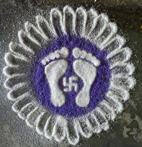 Laxmi padalu Lakshmi Symbol, Lakshmi Pooja Rangoli, Lakshmi Pooja, Lotus Rangoli, Festival Of Light, Diwali Decoration Items, Simple Rangoli Border Designs, Rangoli Borders, Rangoli Ideas