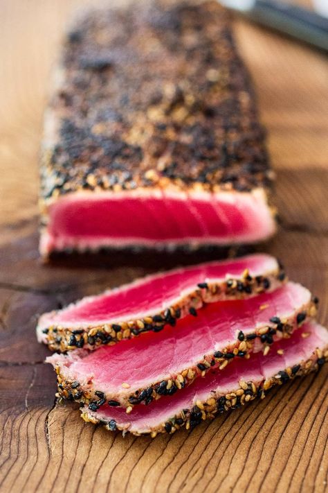 Learn the secret to making perfectly Seared Tuna with a Sesame Seed Crust in just 10 minutes flat. A healthy, delicious ahi tuna recipe that is flavorful and easy to make. Video. Aji Tuna Recipe, Tuna Ahi Recipes, Pan Seared Ahi Tuna Steak, Blackened Ahi Tuna Recipe, Ahi Tuna Recipe Seared, Ahi Tuna Steak Recipe Seared, Cured Tuna, Tuna Sashimi Recipe, Bluefin Tuna Recipe