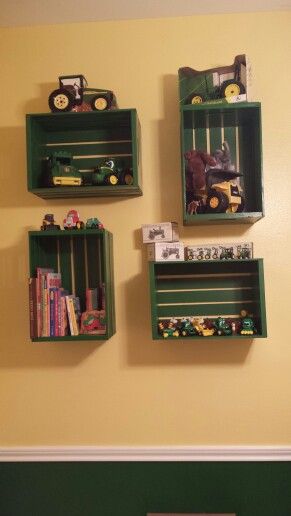 John Deere Nursery Milk Crate shelves. Toy Tractor Display Ideas, Boys Room Tractor Theme, Tractor Bedroom Decor, John Deer Nursery Ideas, Tractor Room Decor Ideas, John Deere Room Ideas Kids, John Deer Bedrooms, Farm Nursery Theme Gender Neutral, Baby Boy Tractor Nursery