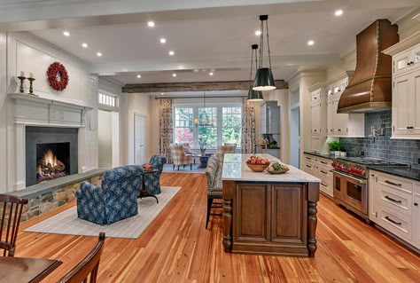 Archer & Buchanan Architecture | New Breakfast Area, Kitchen with fireplace and Sitting Area in addition to 1830s farmhouse. #farmhouse #fireplace #stonehearth #kitchenisland #pancoastclifford #patriciagorman #donpearsephotographers Large Kitchen With Fireplace, Kitchen With Hearth, Kitchen Cabinets Around Fireplace, Fireplace Near Kitchen, Fireplaces In Kitchens, Kitchens With Fireplaces And Island, Farmhouse Kitchen With Fireplace, Fireplace Seating Area Cozy, Kitchen Island Fireplace