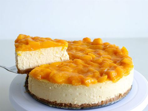 Mango Cheesecake Recipe - The Cooking Foodie Mango Cheesecake Decoration, Mango Cheesecake Bars, Cheesecake Business, Caramel Pecan Cheesecake Recipes, Best Mango Cheesecake Recipe, Mango Topping For Cheesecake, Mango Torte, No Bake Mango Cheesecake Recipes, Baked Mango