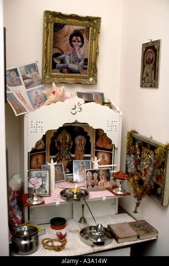 Hindu altar in a London home Stock Photo Hindu Shrine Home, Hindu Shrine, Hindu Altar, Home Shrine, Travel Altar, Indian Table, Buddha Candle, Durbar Square, Buddhist Shrine