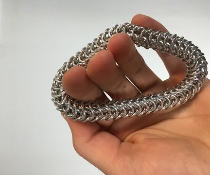 Use a chainmail technique to make a beautiful bracelet. Chain Bracelet Tutorial, Metal Piercing, Chain Bracelet Diy, Chainmaille Tutorial, Chainmail Bracelet, Mens Chain Bracelet, Chainmail Jewelry, Woven Ring, Ring Bracelet Chain