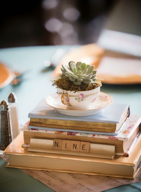 Found this on reddit, front runner for centerpieces. Teacup Succulent, Vintage Wedding Centerpieces Diy, Book Wedding Centerpieces, Vintage Wedding Decorations Diy, Wedding Decorations Diy Centerpiece, Wedding Table Centerpieces Diy, Tea Cup Centerpieces, Succulent Wedding Centerpieces, Vintage Wedding Centerpieces