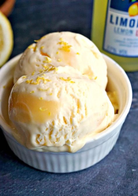 Lemon Curd Ice Cream with Limoncello, a refreshing summer treat with a fantastic zesty kick. This lemon ice cream is no churn, and it's made with condensed milk for a delicious creamy consistency. Super easy to whip up, my boozy ice cream will be a big hit with grown-ups. The lemon curd can be homemade or store-bought, and the limoncello adds a great lemon flavour and a bit of a naughty touch too.#icecream, #lemoncurd, #limoncello, #nochurnicecream, #summertreats No Churn Lemon Ice Cream, Thai Coconut Ice Cream, Limoncello Ice Cream, Lemon Curd Ice Cream, Boozy Ice Cream, Easy Ice Cream Recipe, Lemon Ice Cream, Lemon Ice, Ice Cream Maker Recipes