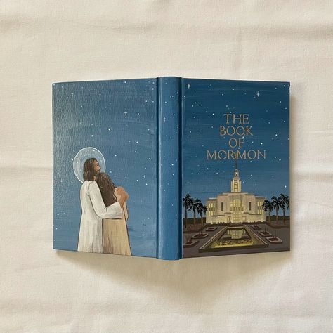 ✨the full cover✨ (Back cover art inspired by Paige Payne Creations) #paintedbookofmormon #redcliffstemple #ldstemple #ilovetoseethetemple #ldsbaptism #calledtoserve #bookofmormon #ldsart #stgeorgeutah Book Of Mormon Cover Art, Book Of Mormon Painted Cover, Cute Art Drawings, Paintings Of Christ, Book Of Mormon Scriptures, Mormon Scriptures, French Ideas, Mormon Art, Lds Baptism