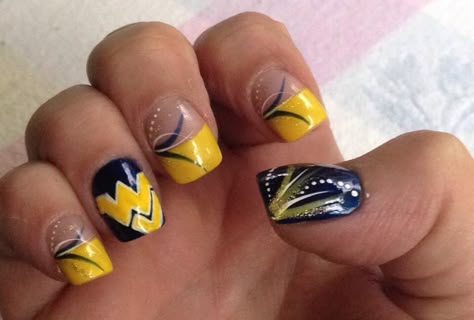 WVU nails by harri @ the house of lacquer Michigan Wolverines Nail Designs, Wv Mountaineer Nails, Wvu Nails Designs, Wvu Nails, Michigan Nails, Wolverine Nails, Football Nail Designs, Football Nails, Easter Nail Designs