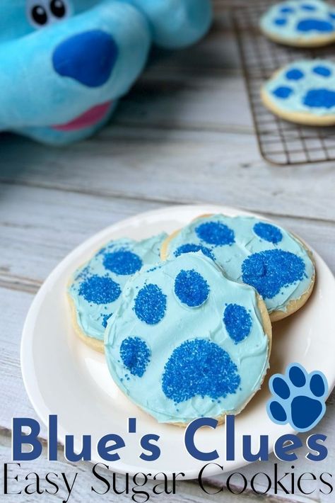 Throw a fun party with these EASY Blue's Clues cookies! They're a sugar cookie base with blue frosting and a sprinkle paw print to decorate. Perfect for a birthday party, snack or movie watching party! Blues Clues Themed Food, Blues Clues Birthday Party One Year Old, Blues Clues Snack Ideas, Blue Clues Birthday Party Ideas Food, Blues Clues Two Birthday, Blues Clues Third Birthday Party, Blues Clues Birthday Party Diy, Blues Clues Food Ideas, Blues Clues Party Games