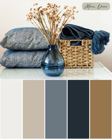 This post is all about my cozy color scheme! My inspiration for this blue and brown color palette is a photograph of a blue vase with dried flowers sitting in front of a woven basket holding a blue throw blanket next to decorative blue and cream-colored pillows. This color palette features earthy cream, blue, and brown hues. In my blog post, I discuss cozy tone colors and provide the color palette hex codes and Sherwin-Williams paint color matches. Grey Beige Navy Color Scheme, Paint Colors For Blue Couch, Navy Blue Beige Brown Living Room, Navy Brown And Cream Living Room, Blue Gray Brown Living Room Decorating Ideas, Grey Blue Decor Living Room, Beige Brown Blue Living Room, Navy Blue White And Beige Living Room, Slate Blue Living Room Color Scheme