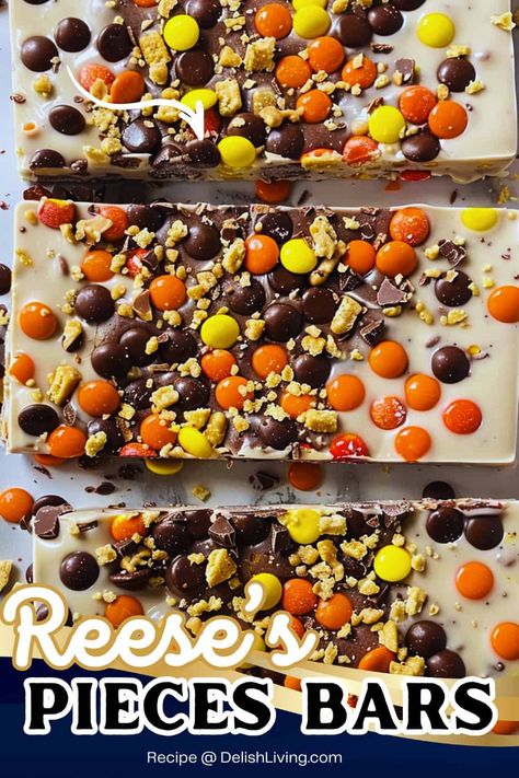 Indulge in the ultimate sweet treat with these homemade Reese’s Pieces Bars! Featuring layers of creamy peanut butter and crunchy Reese’s Pieces, these no-bake bars are the perfect dessert for any occasion. Quick, easy, and packed with chocolatey goodness, they’re a hit for parties, holidays, or an everyday snack. Try this delicious recipe and satisfy your peanut butter cravings in no time! #DessertRecipe #ReesesPieces #PeanutButterLovers #NoBakeDesserts via @delishliving Reese’s Pieces Cake Recipe, Reeses Recipe, Homemade Peanut Butter Cups, Reese's Pieces, Chocolate Candy Recipes, Peanut Butter Cookie Dough, Bark Recipe, Peanut Butter Bars, Peanut Butter Brownies