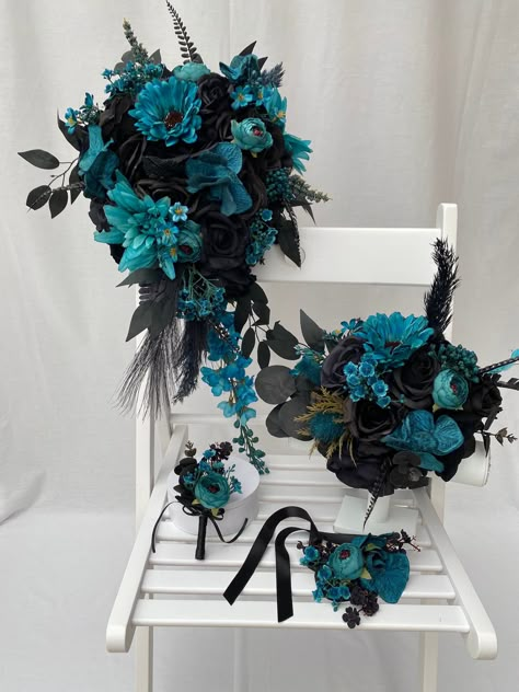 Custom Realistic Artificial Gothic Teal and Black Cascading wedding bouquet. This stunning bouquet has been custom made with quality silk & real touch flowers. The bouquet handle has been wrapped with satin ribbon and come with colour coordinated satin bows.  This bouquet is approximately 22 x 12 inches (54 x 30cm) The matching buttonhole has also been made with silk & real touch flowers & all buttonholes come with integral pin attached. These bouquets are also available in another listing in our shop Bridal bouquet - 10 inches diameter Corsages Black Turquoise Wedding, Sapphire And Black Wedding Theme, Teal And Black Wedding Flowers, Black And Dark Teal Wedding, Navy Blue And Black Wedding Decorations, Teal And Black Wedding Theme, Black And Teal Wedding Dress, Emerald And Dusty Blue Wedding, Deep Teal Wedding Colors