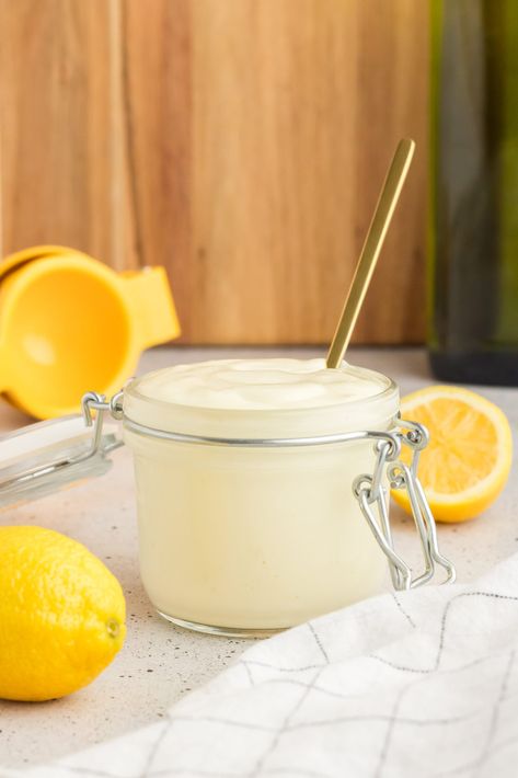 A jar of homemade avocado mayo with a golden spoon, alongside fresh lemons and a citrus squeezer. Avocado Mayo Recipe, Greek Yogurt Tuna Salad, Avocado Mayo, Philly Cheese Steak Casserole, Mayo Recipe, Golden Spoon, Citrus Squeezer, Homemade Mayo, Salad Meal Prep