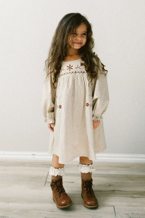 Ava Girls Embroidered Dress #kidsfashion #kidsootd #backtoschooloutfit #holidayoutfit #birthdayoutfit #partyoutfit #minifashionista #stylemini #instakids #fashionkids #toddlerfashion #bigkidstyle #teenfashion Boots And Socks, Girls Winter Outfits, 4t Dress, Brown Embroidery, Long Sleeve Embroidered Dress, Girls Winter Dresses, Hannah Rose, Tan Dress, Girls Fall Outfits