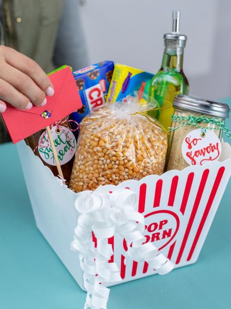 3 Gifts You Can Make With Dollar Store Finds | DIY Gift Box Ideas | HGTV Sweet Popcorn Seasoning, Dollar Store Gifts, Dollar Store Finds, Sweet Boxes, Homemade Gift Baskets, Christmas Gift Baskets Diy, Best Gift Baskets, Kids Gift Baskets, Inexpensive Christmas Gifts