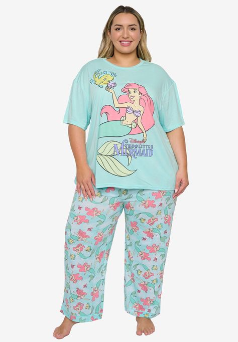 Relive your favorite Disney classic movie with this Little Mermaid t-shirt and pants pajama set.FABRIC: PolyesterT-Shirt features a graphic print of Disney's The Little Mermaid Ariel and Flounder swimming. Pants feature an all-over print of Ariel, Flounder, and Sebastian.Shirt material: 65% Polyester, 35% Rayon. Soft, lightweight and comfy.Classic pajama-style piped hem for pants.Machine Wash cold with similar colors, inside out. Tumble Dry Low. Do not iron graphics.Shirt Measurements: Across chest (underarm to underarm): 1X= 26", 2X=27.5", 3X=29", 4X=30.5", 5X=32". Length (from back of neck): 1X= 29.5", 2X=30", 3X=30.5", 4X=31", 5X=31.5".Lounge Pants Measurements: Waist: 1X= 20.5", 2X=21.5", 3X=22", 4X=24", 5X=25". Onseam: 1X= 26.5", 2X=26.5", 3X=26.5", 4X=26.5", 5X=26.5".Officially licen Flounder And Sebastian, Ariel And Flounder, Classic Disney Movies, T Shirt And Pants, Disney The Little Mermaid, Classic Pajamas, Little Mermaid Ariel, Ariel The Little Mermaid, Swimsuits For All