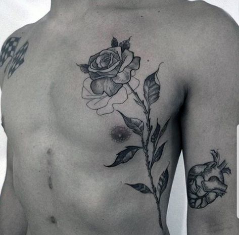 Men Chest Flower Tattoo, Rose Tattoo On Chest Men, Chest Tattoo Men One Side, Rose Tattoo Men Ribs, Side Tattoos For Men Ribs Design, Rose On Chest Tattoo, Man Flower Tattoo, Flower Chest Tattoo Men, Right Chest Tattoo Men