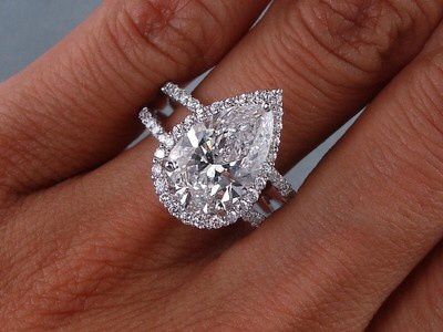 Pear with halo and double band.  This is Beautiful maybe not so big b/c i like having my finger, but I love this! Pear Shaped Diamond Engagement Rings, Pave Diamond Engagement Rings, Antique Engagement Ring, Antique Engagement, Natural Diamond Engagement Ring, Rings Gold, Pear Shaped Diamond, Anniversary Bands, Dream Ring