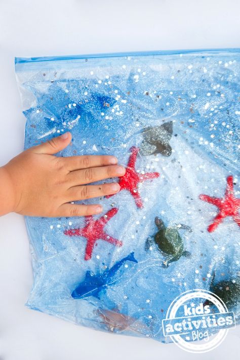 Ocean Sensory Bag - fun exploration for babies Sensory Ocean Activities, Ocean Sensory Bags, Ocean Sensory Activities, Sensory Bin Ocean, Sensory Bags For Babies, Ocean Sensory Bin, Ocean Activities Preschool, Ocean Sensory, Toddlers Activities